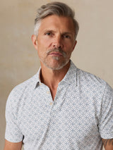 Faherty Short Sleeve Movement Pique Polo - Ivory Blue Moonlight