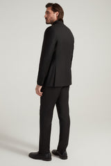 Samuelsohn black peak lapel tuxedo on model, back - Oak Hall