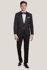 Jack Victor black peak lapel tuxedo on model, full length - Oak Hall
